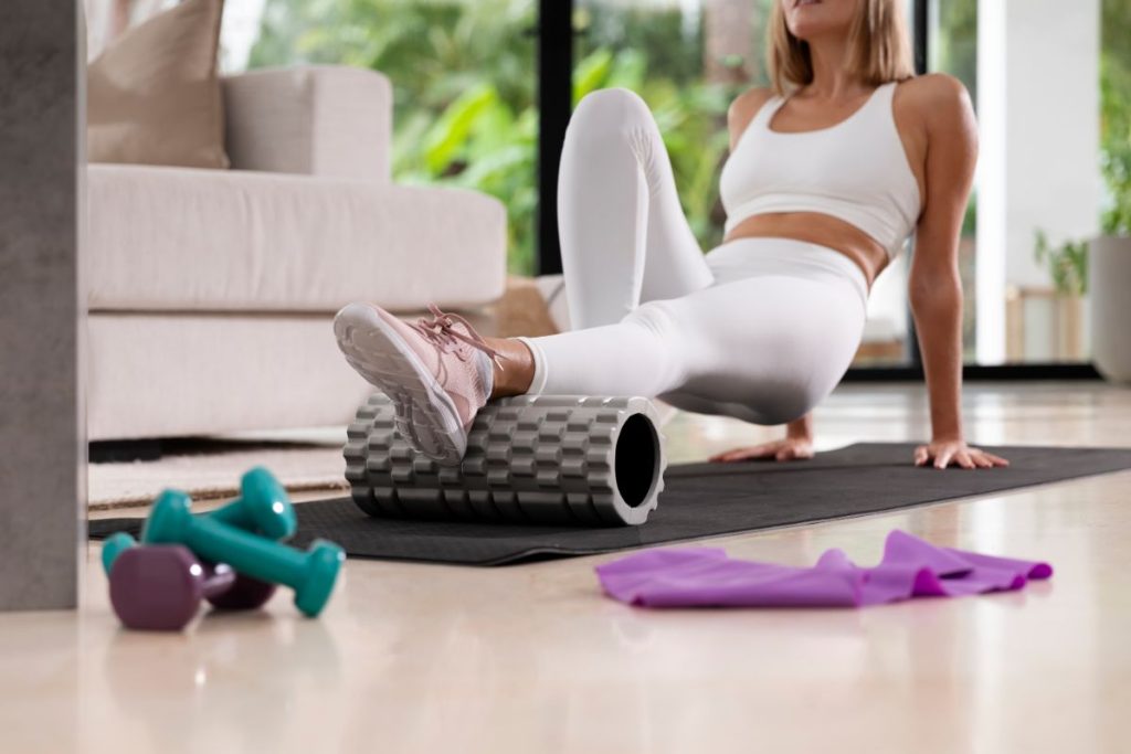  A serene morning workout scene with a yoga mat and dumbbells,